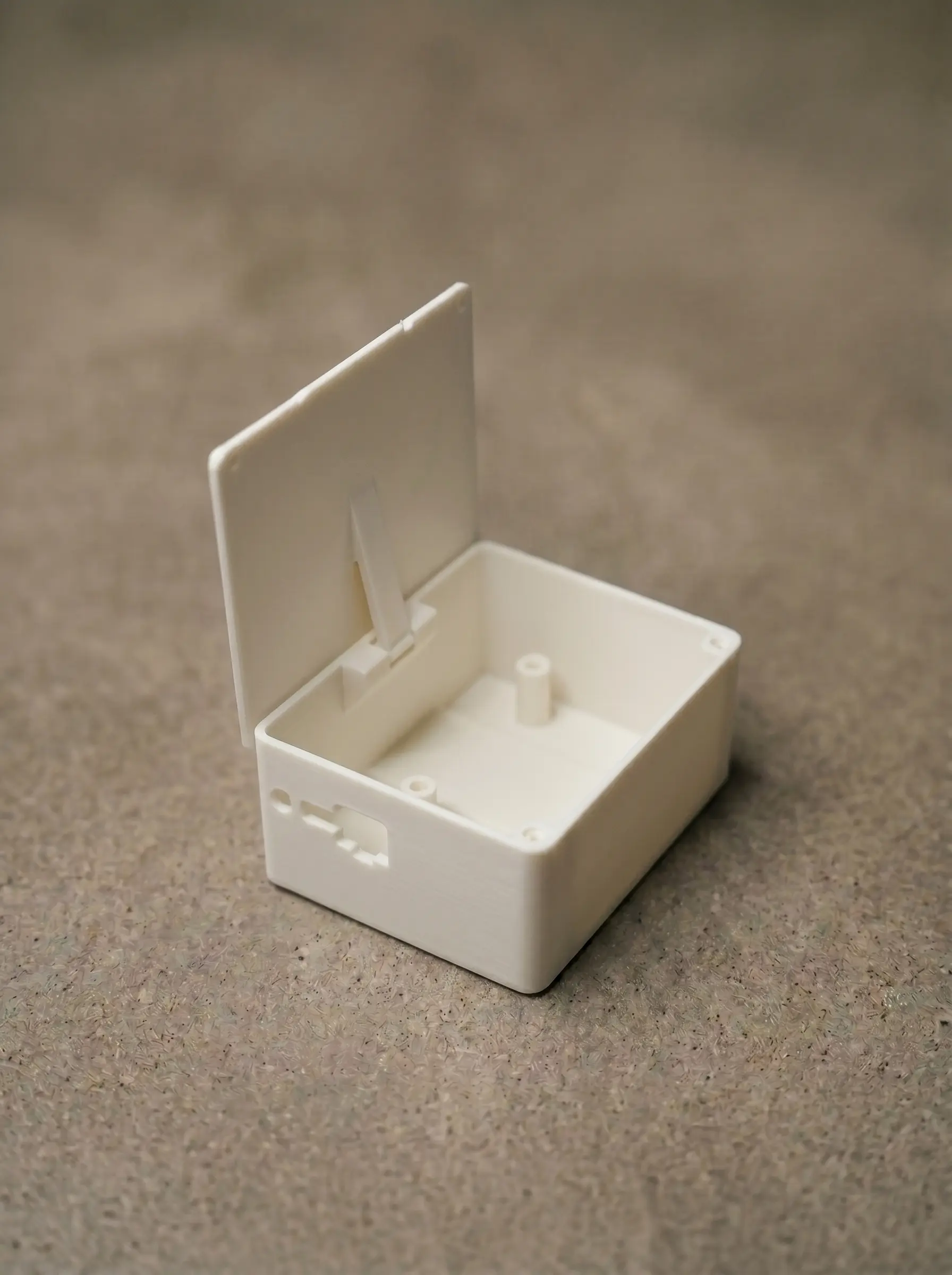Outdoor electronics housing — designed from scratch in CAD: ASA print, ventilation slits, locking lid, fastener bosses
